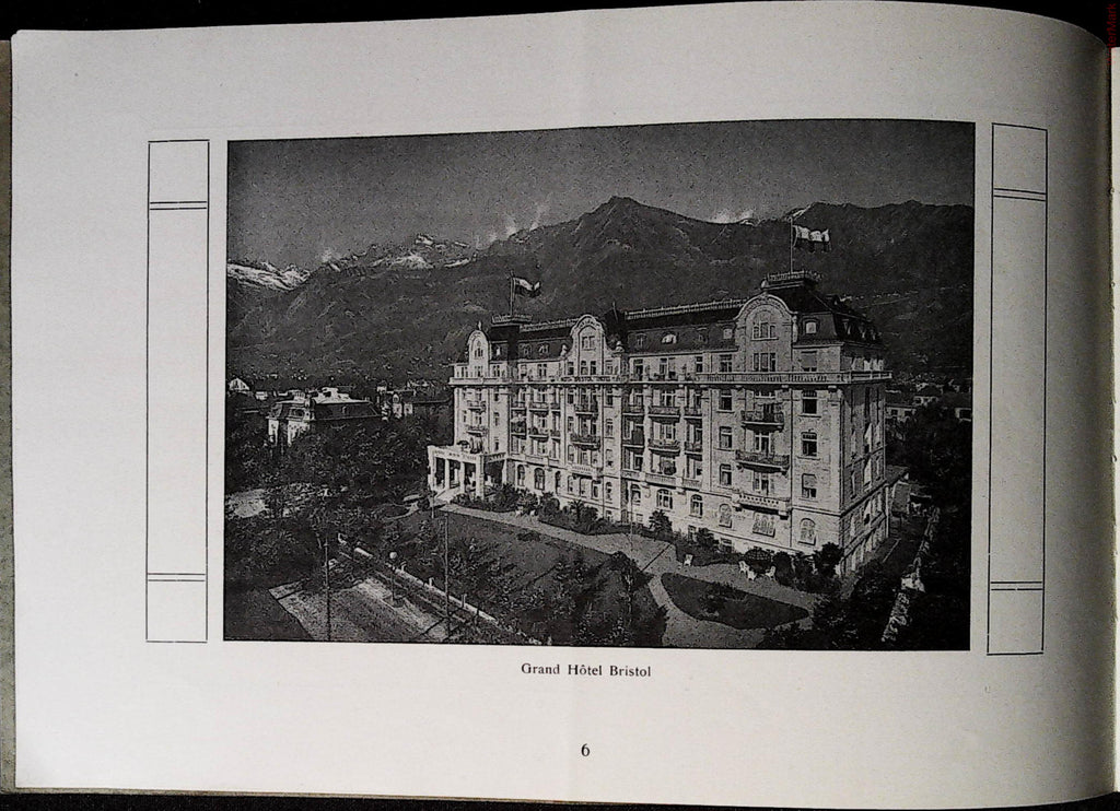Grand Hotel Bristol exterior with mountain backdrop