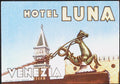 Hotel Luna Venice Italy luggage label with decorative seahorse and bell tower on pale blue background
