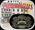 Hotel Brauhaus Villach luggage label with red lettering, hotel building and two lions holding beer tankards
