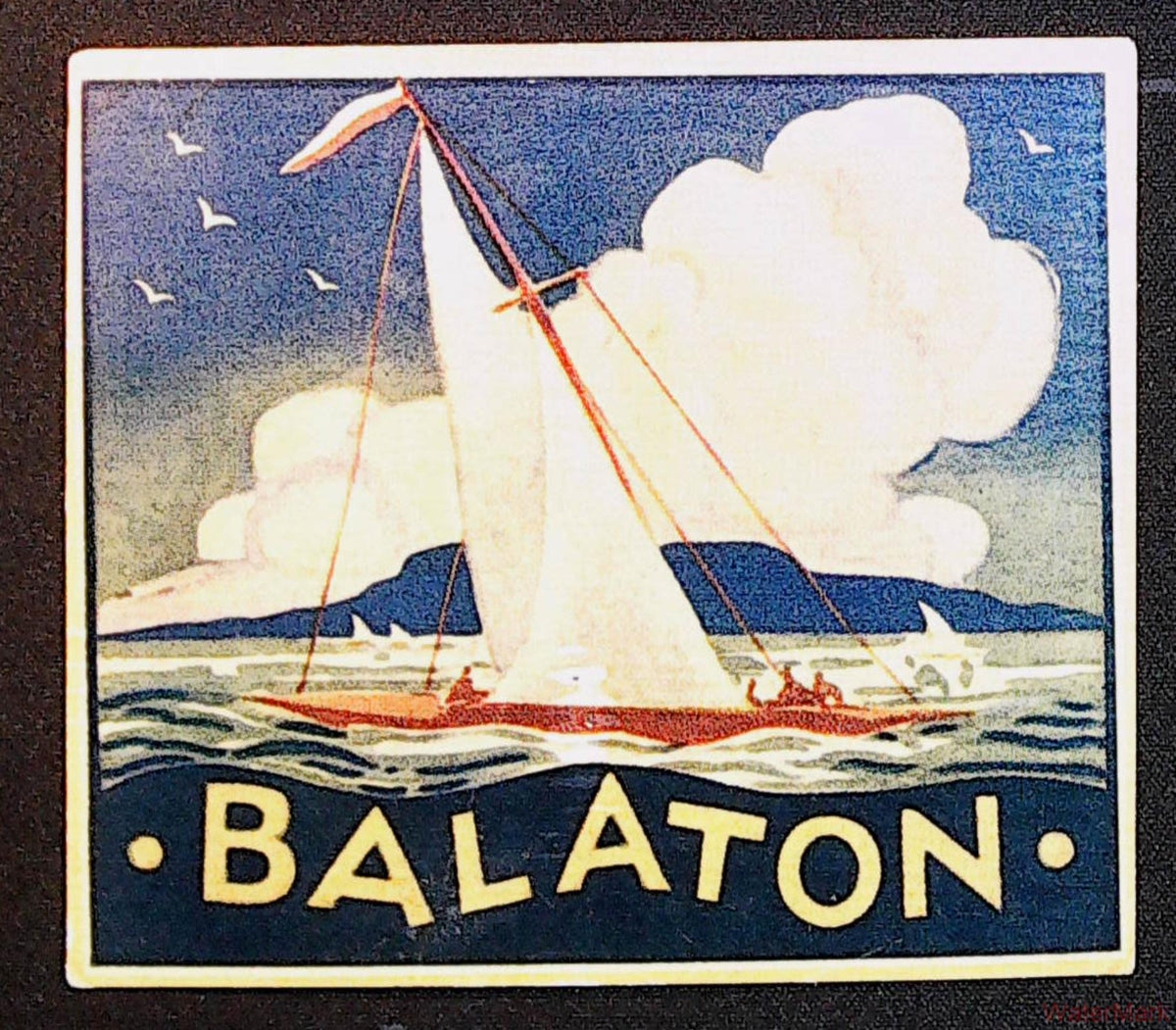Balaton travel luggage label showing a red-hulled sailboat, white sails, clouds and yellow Balaton lettering