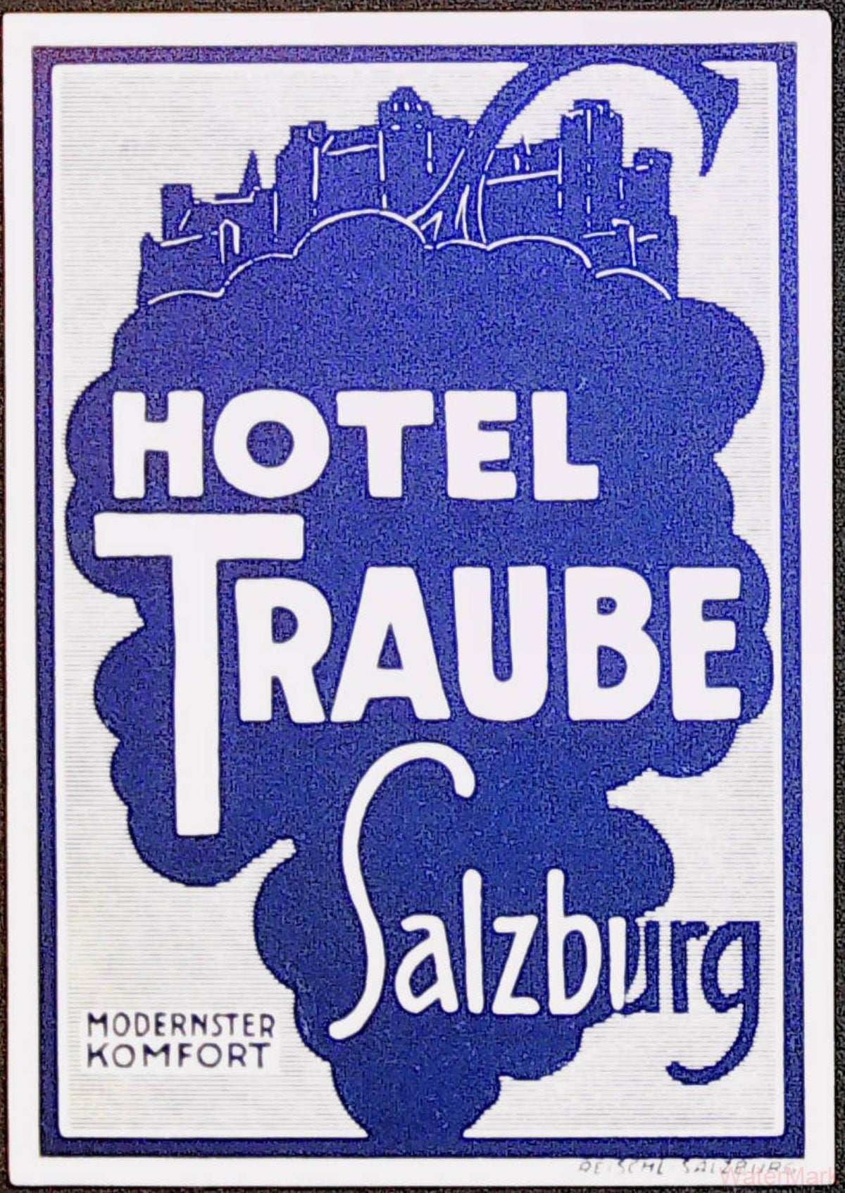 1930s Hotel Traube Salzburg Austria luggage label with blue grape silhouette, fortress and white lettering